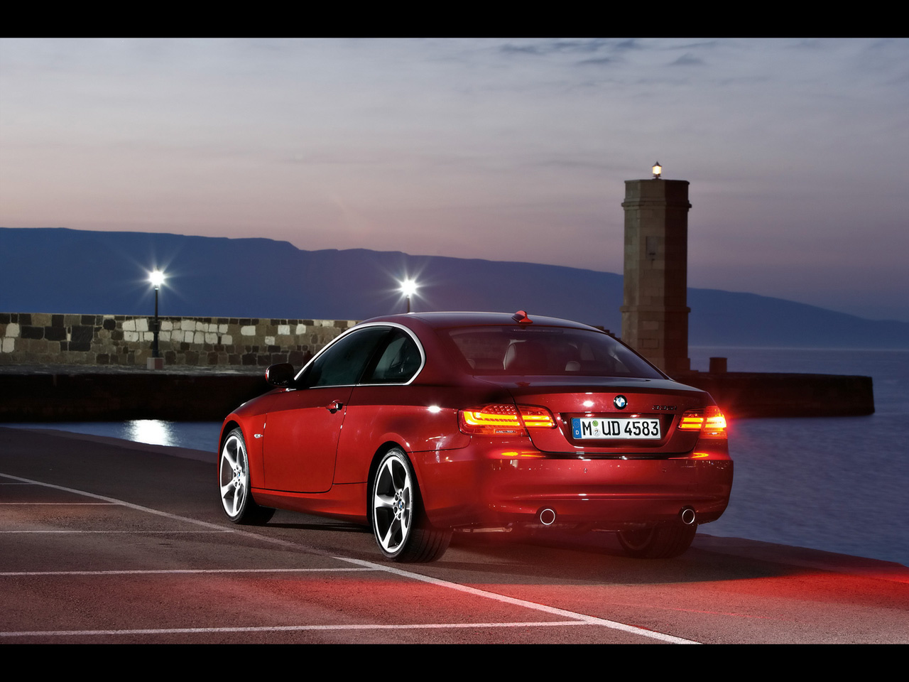 2010-BMW-3-Series-Red-Rear-Angle-Sunset-1280x960